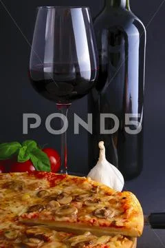 Pizza and wine Stock Photos