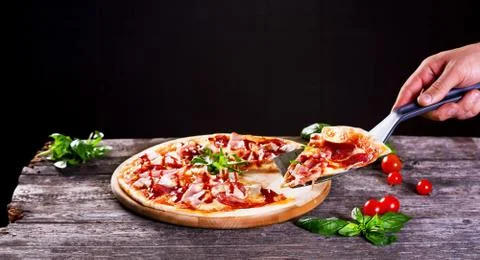 Pizza with bacon and tomato paste Stock Photos