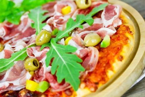 Pizza with bacon Stock Photos