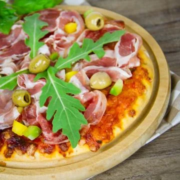 Pizza with bacon Stock Photos
