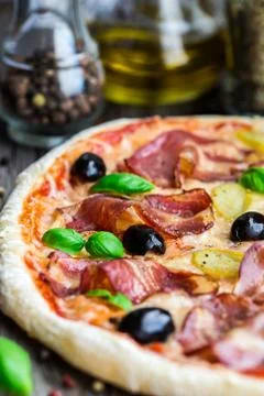 Pizza with bacon Stock Photos