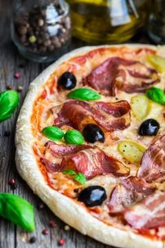 Pizza with bacon Stock Photos