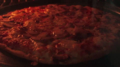 Pizza bakes inside oven, golden crust forms Stock Footage 337654701
