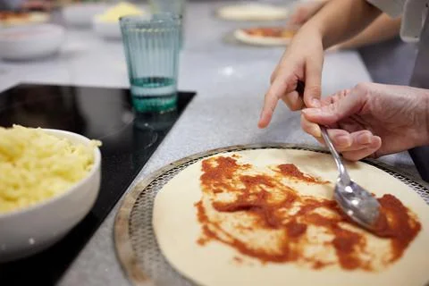 Pizza baking master class for children. Children's birthday. Stock Photos