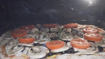 Pizza baking in the oven. Fast forward Stock Footage 86034423