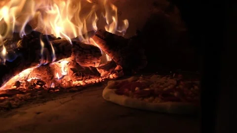 Pizza baking in oven Stock Footage 148080959