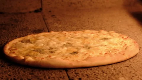 Pizza baking in the oven slow motion Video stock 198401183