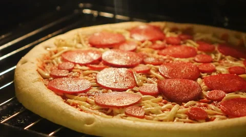 Pizza baking in the oven Time-Lapse Stock Footage 58938022