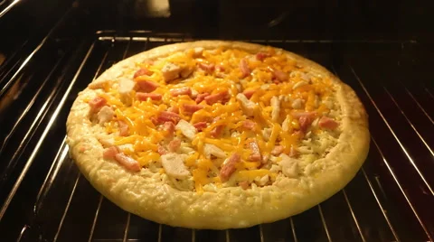 Pizza baking in the oven Time-Lapse Stock Footage 58938045