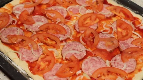The pizza base. pizza cooking. put olives in the pizza. arrange the ingredients Stock Footage 78589205
