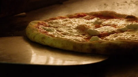 Pizza being kept in the oven for baking Video stock 103417466