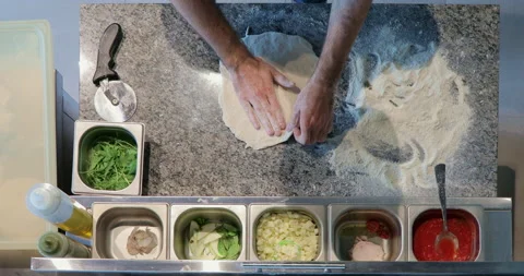 Pizza is being prepared in the kitchen, time lapse. Stock Footage 158995133