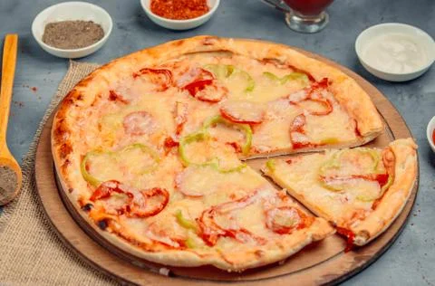 Pizza with bell pepper on the table Stock Photos