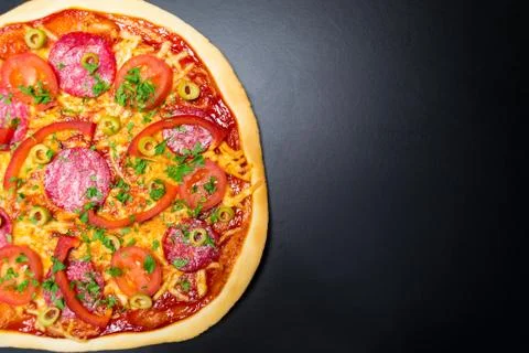 Pizza on a black background Foto stock