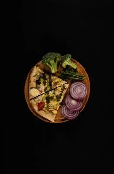 Pizza on black background Stock Photos