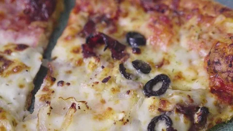 Pizza with Black Olives and Onions Stock Footage