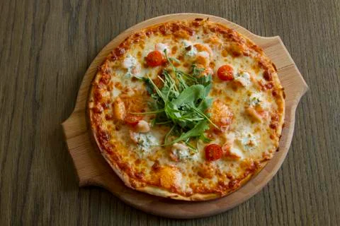 Pizza on the board Stock Photos