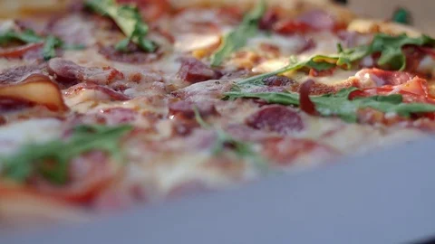 Pizza in a box close-up delivery slowmo Stock Footage 127541705