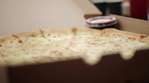 Pizza in a box close-up delivery slowmo Stock Footage 127541770