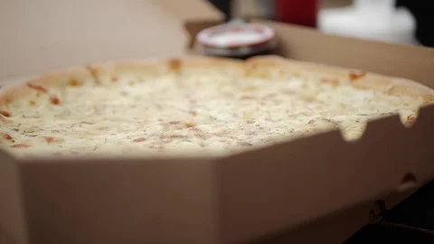 Pizza in a box close-up delivery slowmo Stock Footage 127541772