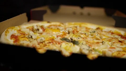 Pizza in a box close-up delivery slowmo Video stock 127541912