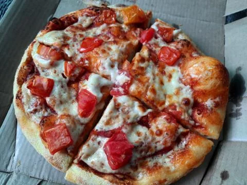 Pizza on box Stock Photos