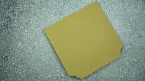 A pizza box quickly enters the frame. Pizza delivery banner. Top view Stock Footage 297315832