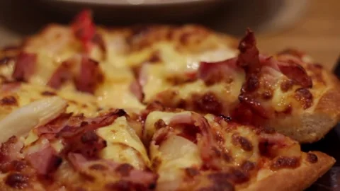 Pizza in a box on the table. Dolly slider extreme close-up. Home party. Top view Video stock 336586737