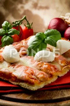 Pizza with buffalo mozzarella Stock Photos