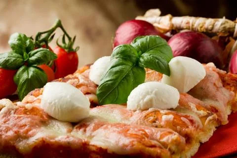 Pizza with buffalo mozzarella Stock Photos