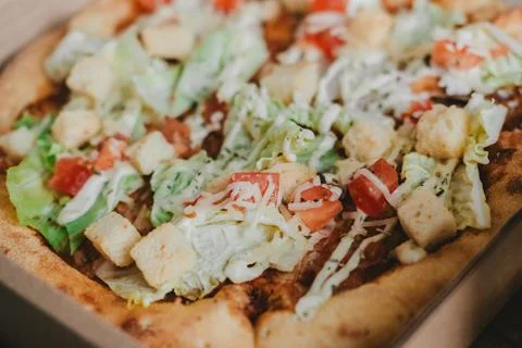 Pizza caesar with chicken close-up Stock Photos