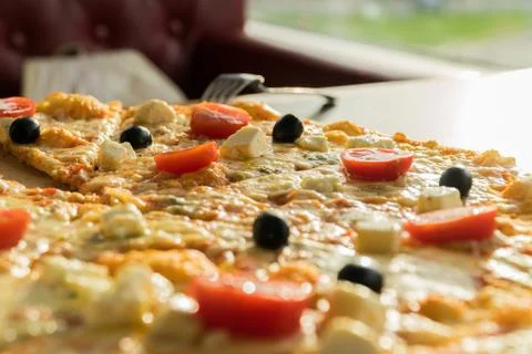 Pizza in cafe. Close up view. Top view 库存照片