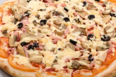 Pizza with cheese and ham Stock Photos