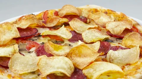 Pizza with chips and salami Stock Footage 53581182