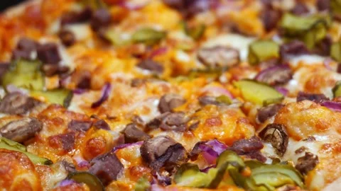 Pizza close-up. close-up of a rotating pizza Stock Footage 168730568