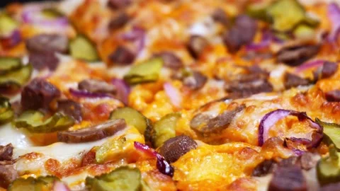 Pizza close-up. close-up of a rotating pizza Stock Footage 168793662