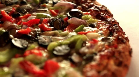 Pizza close up rotating Slow motion Stock Footage 30473084