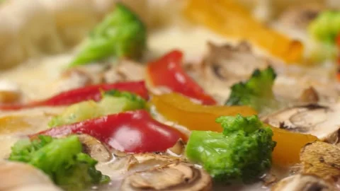 Pizza close up spinning in front of the camera. Video stock 194379425