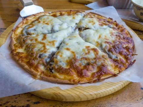 Pizza close-up view on a table Stockfoto's