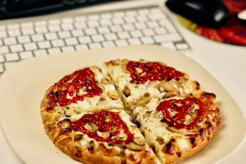 Pizza computer keyboard Foto stock