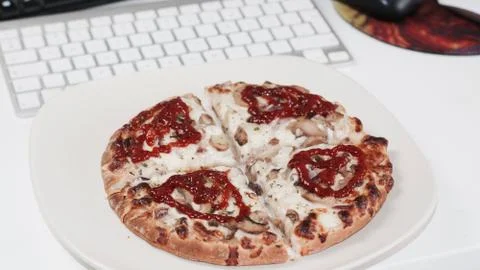 Pizza computer keyboard Stock Photos