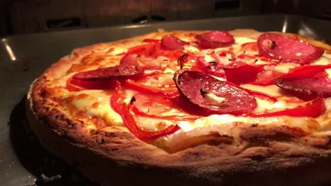 Pizza cooked in oven Close-Up Stock Footage 165875361