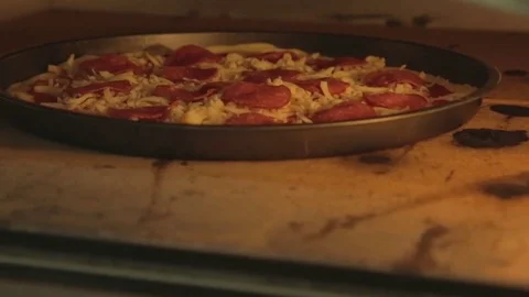Pizza is cooked in the oven Stock Footage 83294657