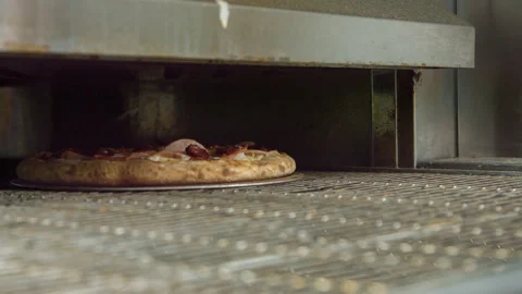 Pizza is cooked in the oven Stock Footage 142401164
