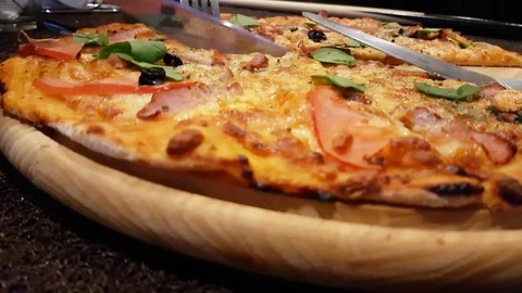 Pizza cut with a knife Stock Footage 80839515