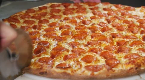 Pizza Cutter Slicing Cooked Pepperoni Commercial Industrial Stone Oven Video stock 66076210