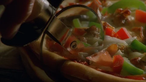 Pizza Cutting 1 NG Stock Footage 110823100