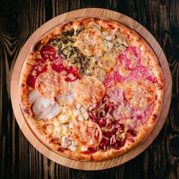 Pizza on a cutting board Stock Photos