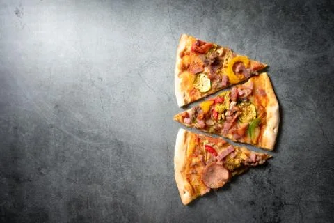 Pizza on dark background Stock Photos