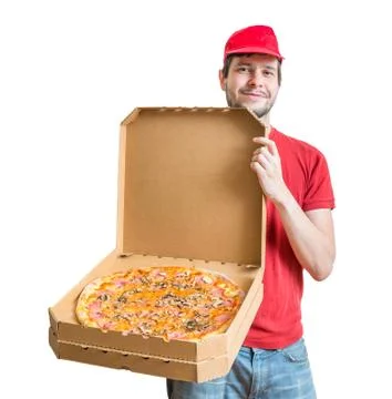 Pizza delivery concept. Young guy is showing tasty pizza in box. Isolated on  Stock-Fotos